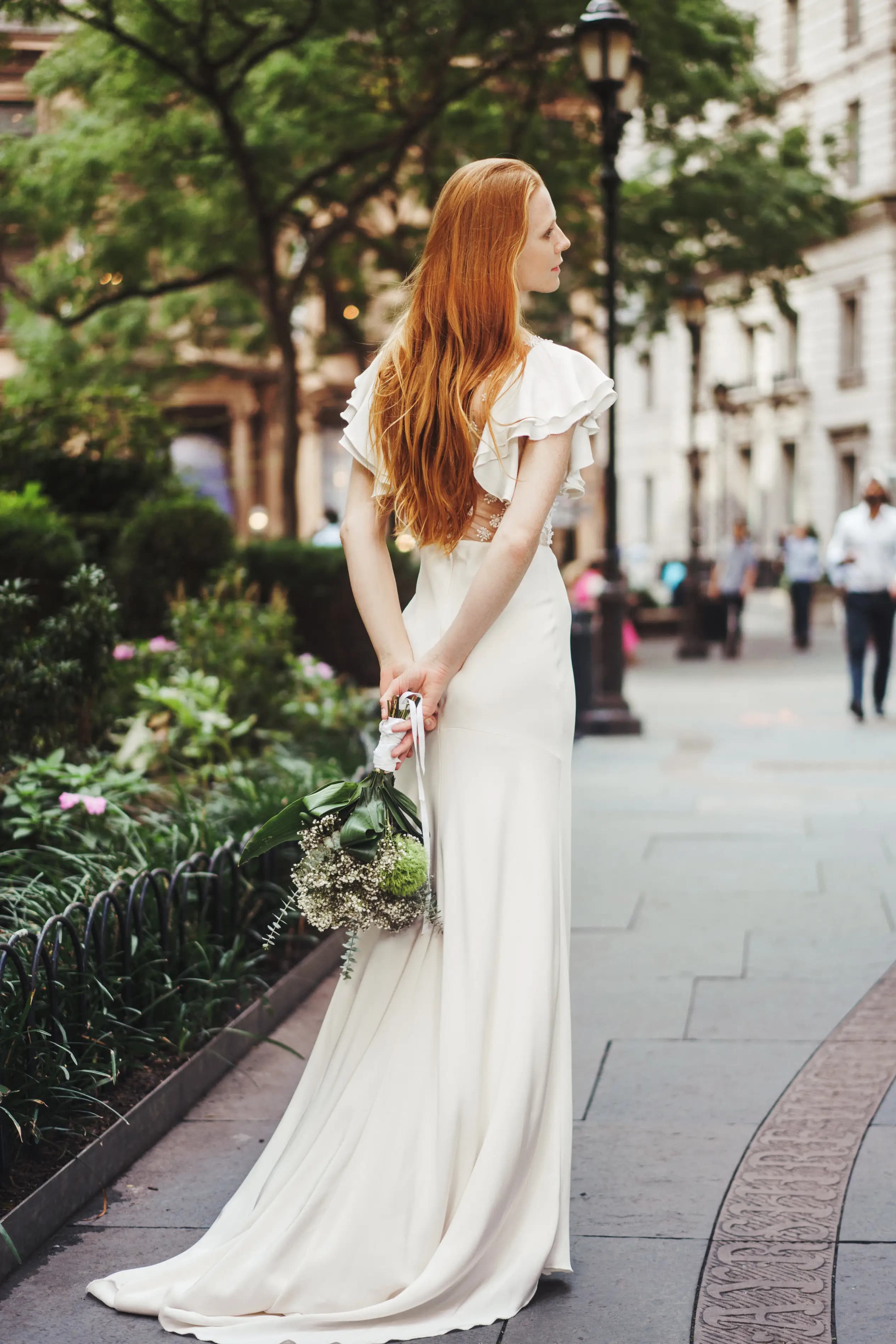 Bride wearing a Nazarela gown in a wood-panelled room